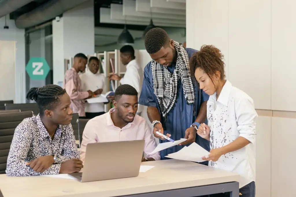 A diverse team collaborating on a project in a modern office environment.